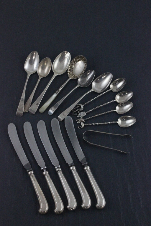 A quantity of hallmarked silver cutlery; to include five pistol grip tea knives together with a
