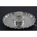 A late Victorian Goldsmith and Silvermans hallmarked silver single bottle standish; Gibson and