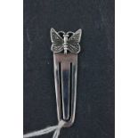 A small 925 silver standard bookmark; surmounted with a butterfly