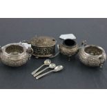A pair of late Victorian silver hallmarked salts; each with pair of 'C' scroll handles; L Bros;
