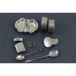 A collection of hallmarked silver to include; an oval plain pill box; Crisford & Norris Ltd;
