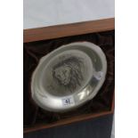 A French sterling silver dish; with etched decoration of a lion by Bernard Buffet, dated 1976,