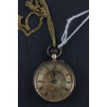 A hallmarked 9ct yellow gold fob watch; together with a plated necklace