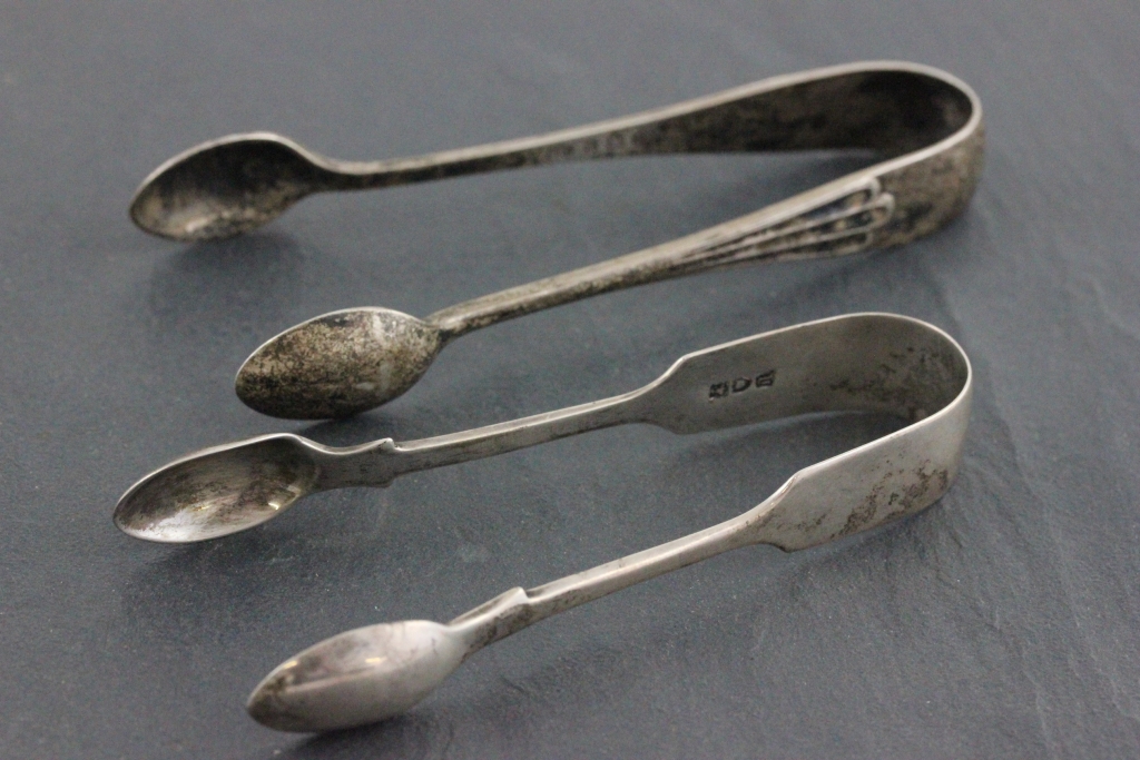 A mid Victorian pair of Elkington & Co hallmarked silver sugar tongs; Elkington & Co, Birmingham