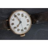 A 9ct yellow gold trench type watch