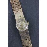 A 9ct yellow gold ladies Rotary wristwatch and strap