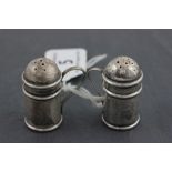 A late Victorian miniature hallmarked silver novelty salt and pepper set; in the form of flour