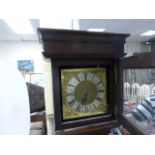 An 18th century oak longcase clock; the brass dial and movement by Perkins of Evesham; with square