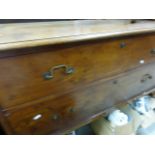 A walnut chest of two long drawers; raised on cabriole supports