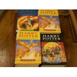 A group of four Harry Potter first edtion books; to include Harry Potter and the Order of the
