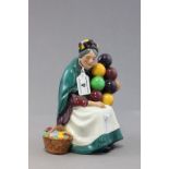 A Royal Doulton figurine; The Old Balloon Seller; HN1315