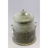 A late 19th / early 20th century tin twin handled lidded coal bucket; bearing a coat of arms