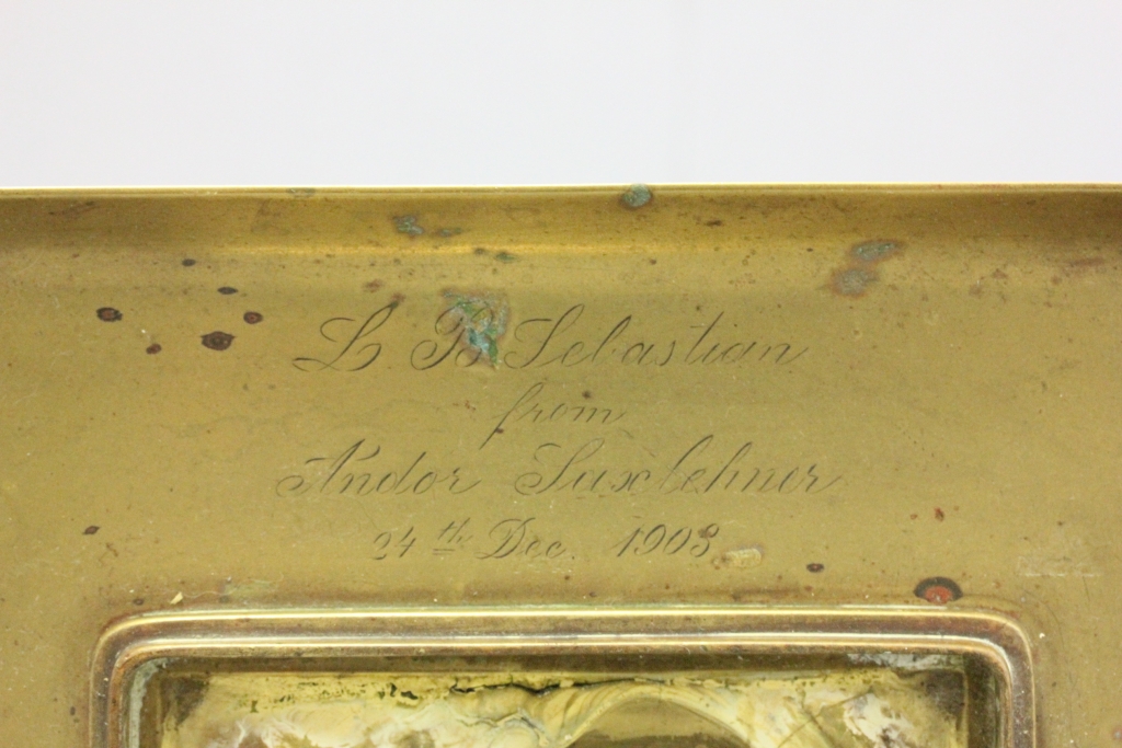 A large Edwardian brass single bottle standish; bearing presentation inscription - Image 2 of 2