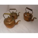 Three copper kettles