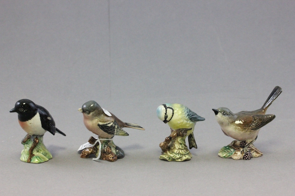 Four Beswick birds; 'Blue Tit', Whitethroat, Chaffinch, & Stone Chat