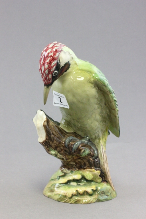 A Beswisk pottery of a Green Woodpecker; with impressed 1283 to base