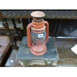 A vintage lamp together with a leather bound Victorian bible