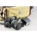 An Olympus OM10 digital camera; complete with accessories and camera bag
