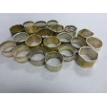 A large quantity of various silver plated napkin rings