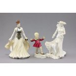 Two Royal Worcester porcelain figures; January modelled by F. G Doughty together with Grace modelled