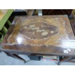 A good quality Louis XV style inlaid fold over table; with gilt applied decoration; raised on four