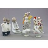 Two Nao porcelain figures; Two choir boys and a girl reading; together with Lladro porcelain geese