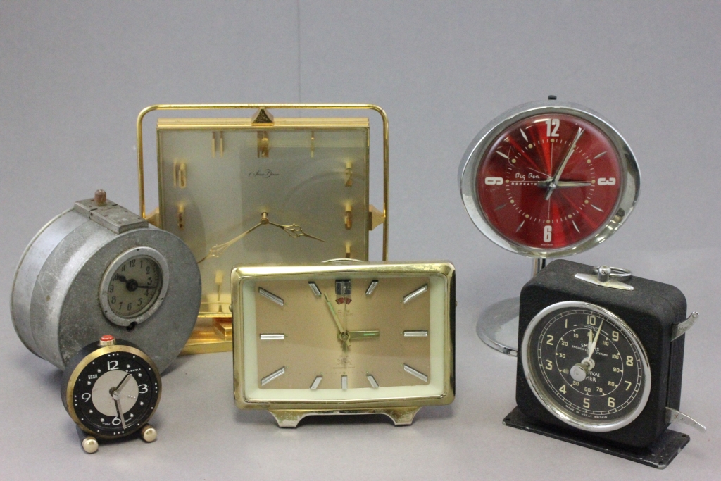 Box of assorted clocks