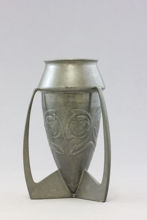 Archibald Knox for Liberty & Co; a pewter vase of torpedo form, bearing impressed 0226 to base;