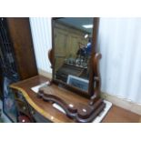 A Victorian mahogany serpentine fronted dressing table mirror
