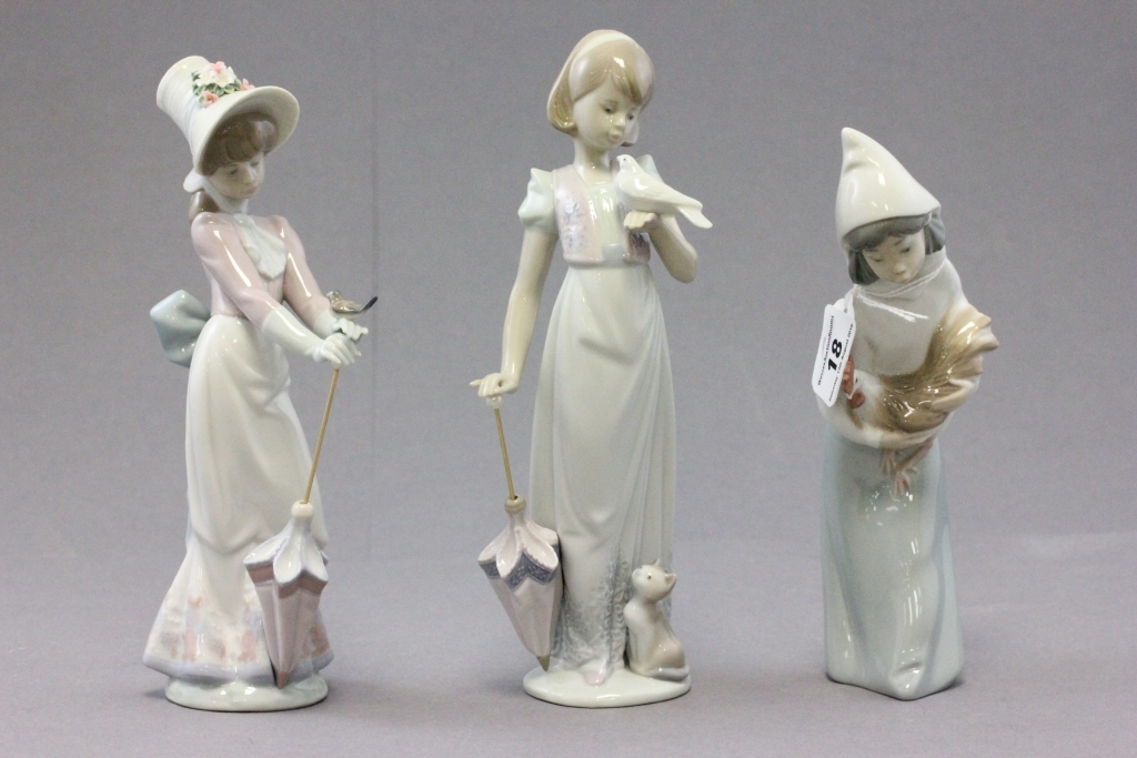 Three boxed Lladro porcelian figures; Sheppess with Rooster; Garden Song and Summer Stroll