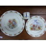 Three pieces of Royal Doulton Bunnykins comprising of two plates and an egg cup