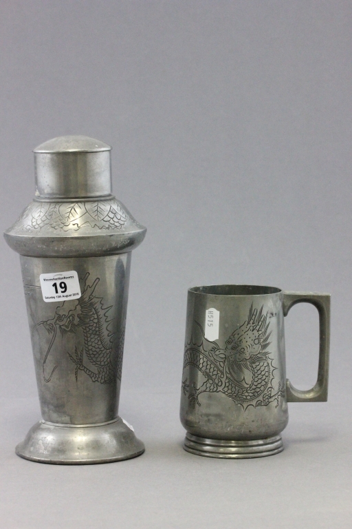 A Huikee Pewter cocktail shaker; together with shot glasses and pewter tankard; all with engraved