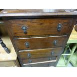 A 1930s oak chest of six drawers; raised on shaped bracket feet