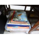 A box of various Rupert the Bear and other children's annuals