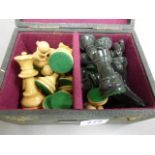 A complete set of turned wooden chess pieces