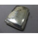 A small late Victorian hallmarked silver cigarette case; George Unitte; London 1887; with engraved