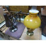 A vintage angle poise lamp and brass oil lamp