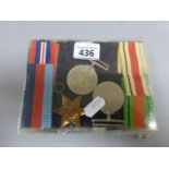 The Africa Star; The Defence Medal and 1939-1945 Medal; a group of three World War II medals; each