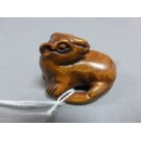 Signed wood netsuke of a beast