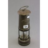 An E. Thomas and Williams brass miners lamp