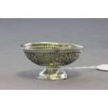 A small 19th century; possibly French silver sweet meat dish; embossed with bouquets of flowers