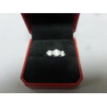 An 18ct white gold three stone diamond ring of 1.44ct's