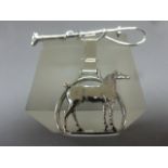 A silver cravat pin horse brooch