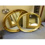 Two Oval gilt framed mirrors