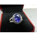 A silver, CZ & amethyst set dress ring