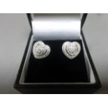 Pair of silver & CZ heart shaped earrings