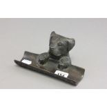 Bronze pen rest in the form of a dog