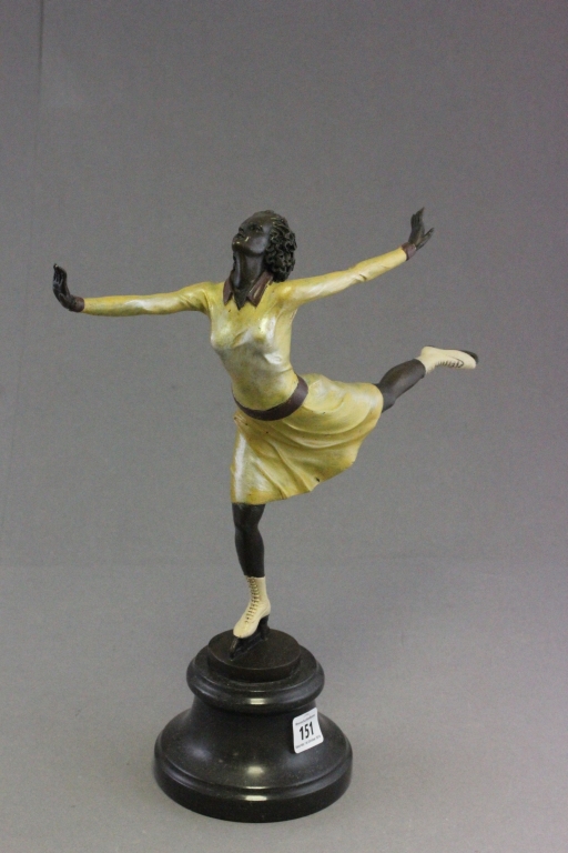 Cold painted bronze figure of an ice skater on marble base