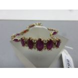 A silver & faux ruby bracelet