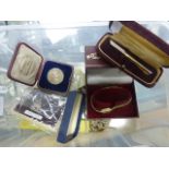 A collection of costume jewellery, silver medallion, cufflinks, pens etc